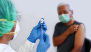 voice recording for medical offices show a person getting a vaccine at a doctor's office