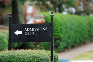 photo of an admissions office sign that uses professional IVR prompts for universities