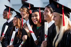 photo of graduates at a college that uses professional IVR prompts for universities